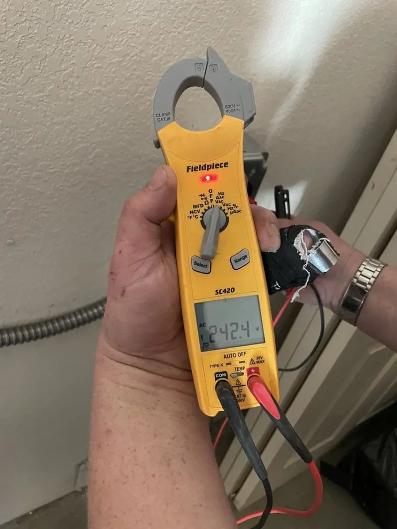 Voltage testing with clamp meter during Circuit Breaker Repair in Gallipolis